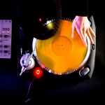 DJ spinning at a club music